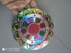 A pair of diya holders