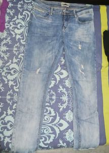 Distressed Denim Jeans