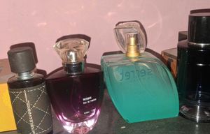 combo of empty perfume bottles