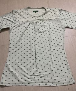 Light greenish blue top (Never worn before)