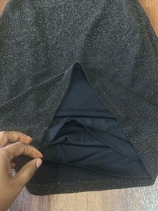 Black and golden shimmery dress in size M
