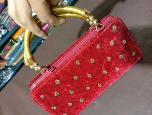 Elegant Red Embroidered Clutch