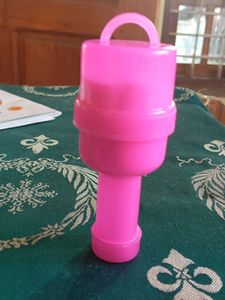 Pink Plastic Oil Spreader