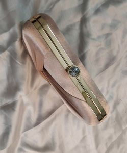 Clutch With Sling Chain And Handle