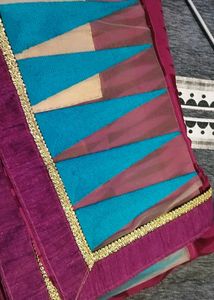 Saree In Multi Colour With Golden Lace.