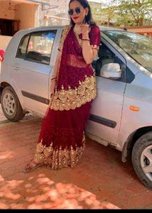 Elegant Maroon Embroidered Saree
