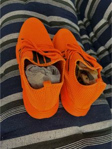 Orange sports shoes for mens