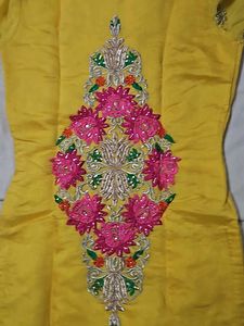 Yellow Kurti With Pink Embroidery