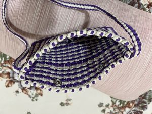 A Handmade Macrame Sling Bag.