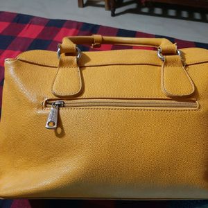 Diana Korr mustard coloured bag