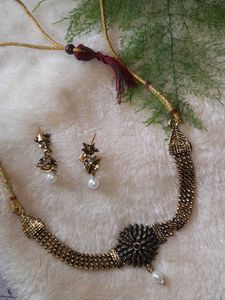 Neckpiece And Earpiece