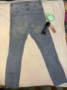 Ripped Knee Denim Jeans