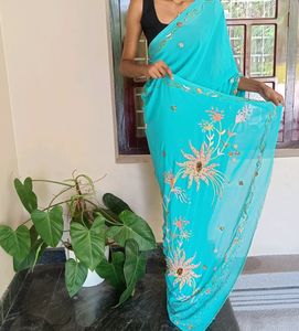 Teal Blue Colour Saree With Heavy Work Pallu.