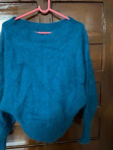 a beautiful teal colour top
