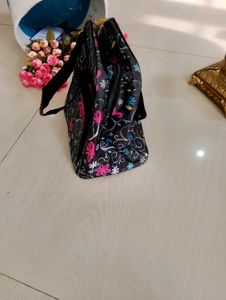 2. Black Floral Handbag
