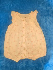 Flounce-trimmed romper Suit