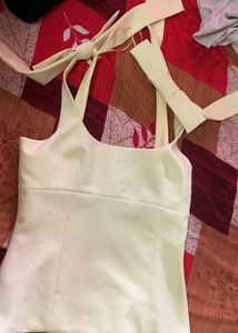 STRETCH TOP WITH BOWS