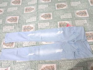 Ripped Light Blue Jeans
