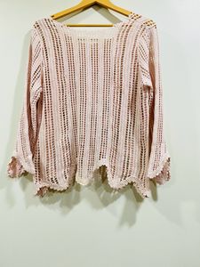A Beautiful Top With Net Type Of Work On It
