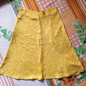 women floral printed high rise side slit skirt.