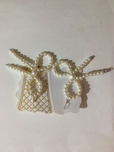 Pearl Bead Bow Dangling Earrings