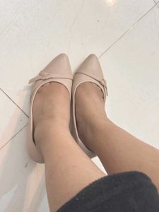 Elegant Nude Heels with Bow Detail