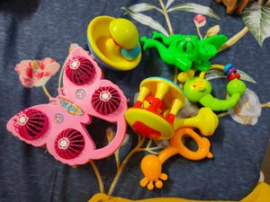 8 new born rattles