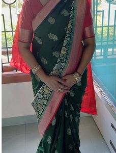 Green Banarasi Saree with Red Blouse