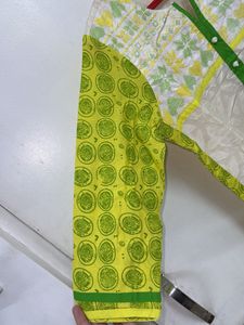 Beautiful White Kurti With Green Embroidery
