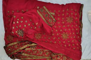 Elegant Red Georgette Saree with Golden Embroidery