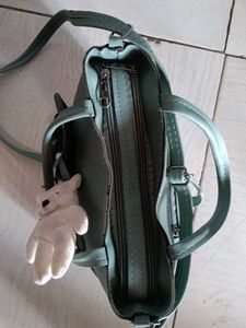 Elegant Green Handbag with Floral Detail