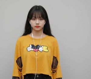 This is a orange korean top