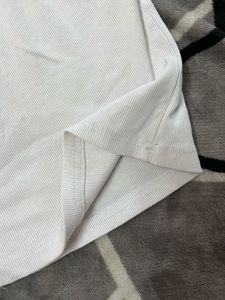 White Sleeveless Top