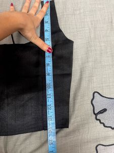 backless black blouse