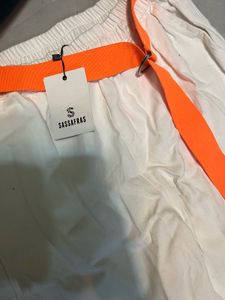 White High-Waisted Cotton Pants with Orange Belt