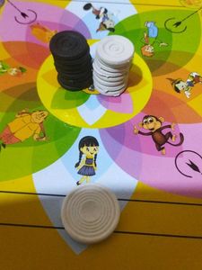 Mini Carrom Board And Ludo 2 In 1.