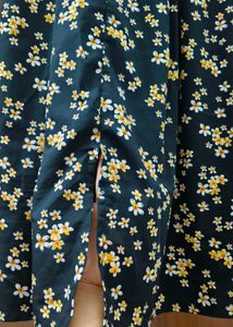 Black dress with yellow n white flowers