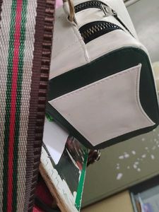 Green And White Sling Purse