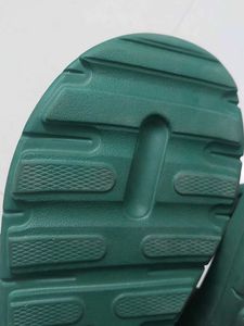 Branded Green flip-flops