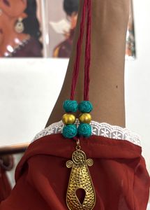 Beaded Thread Necklace With Brass Pendant