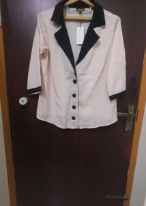 Chic Pink Blazer with Black Trim