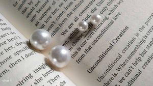 pearl stud earrings.