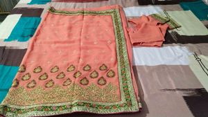 Beautiful Peach Sari With Stitch Blouse