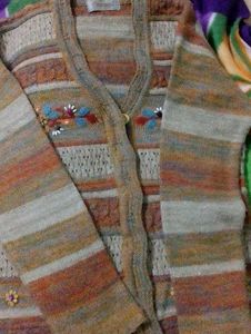 Cardigan of embroidery and beads work