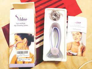 SILDNE face and body hair threading system