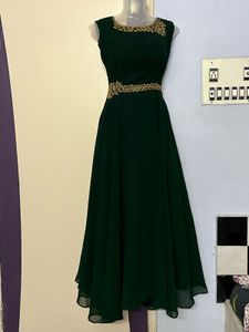 Pintrest padded green designer party wear gown