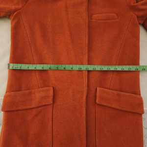 orange statement coat 🧥