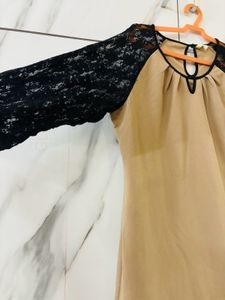 Beige Top With Black Net Sleeves