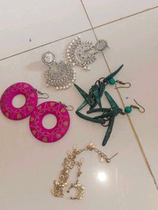 3 Pairs Of Earrings And A Nose Ring Like Noth.