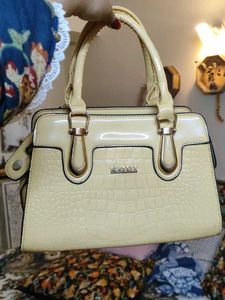butter yellow handbag